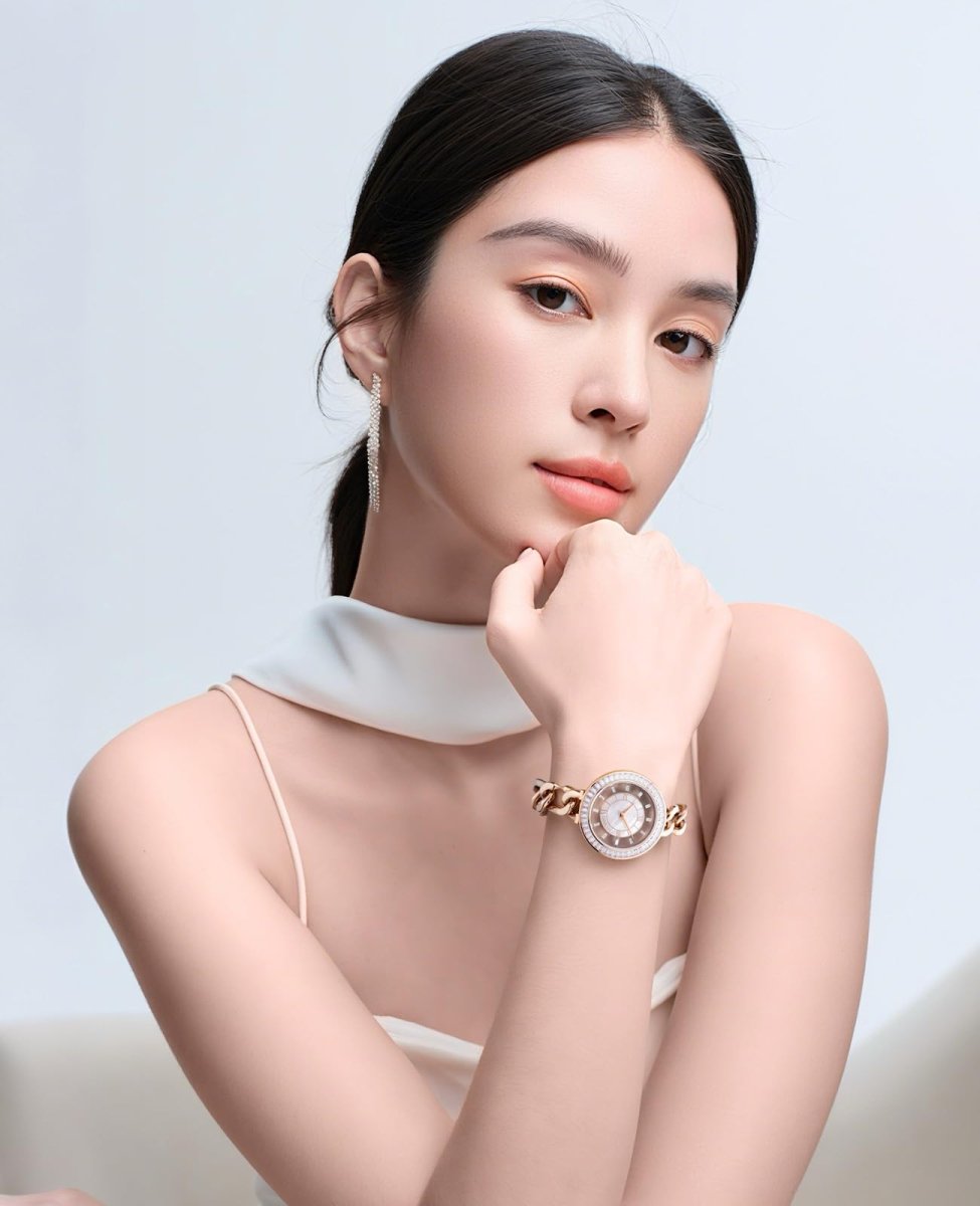 "Portrait view of a model wearing the luxury timepiece, highlighting an elegant, sophisticated aesthetic.