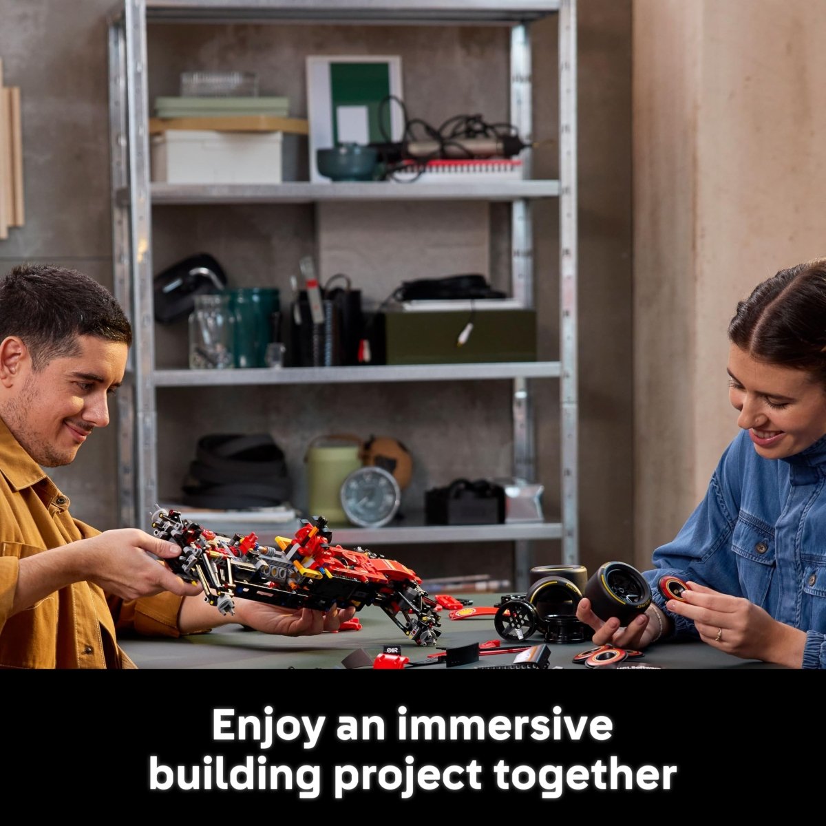 Close-up lifestyle shot of two people enjoying an immersive building project together at home.