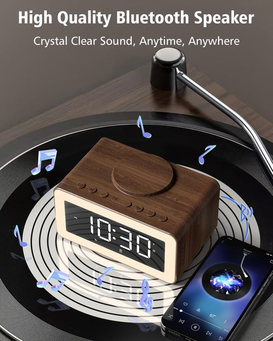 Top-down product showcase of the multi-functional Bluetooth speaker and digital alarm clock featuring a dark wood-grain finish.