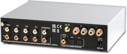 Rear panel of an advanced audio amplifier showing input terminals and connection options.