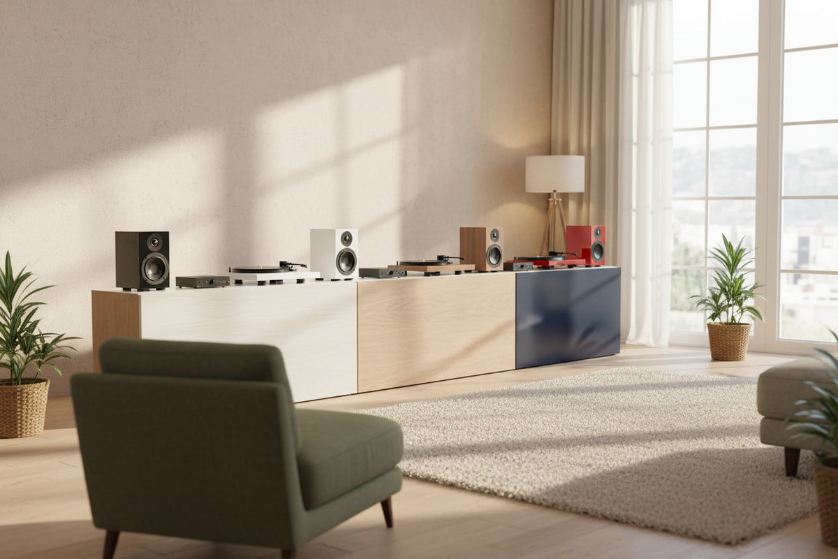 Interior view of a spacious, modern living room setup featuring high-end speakers and refined minimalist decor.