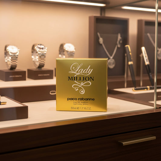 Paco Rabanne Lady Million gold perfume box displayed prominently on a counter inside a sophisticated, warmly lit luxury boutique.